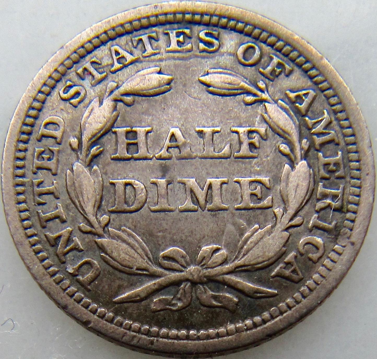 1858-Half-Dime-With-Inverted-Date