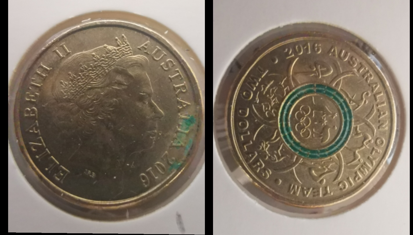 2016-$2-Australian-Olympic-Green-Coin-Has-Paint-Transfer-From-Another-Coin