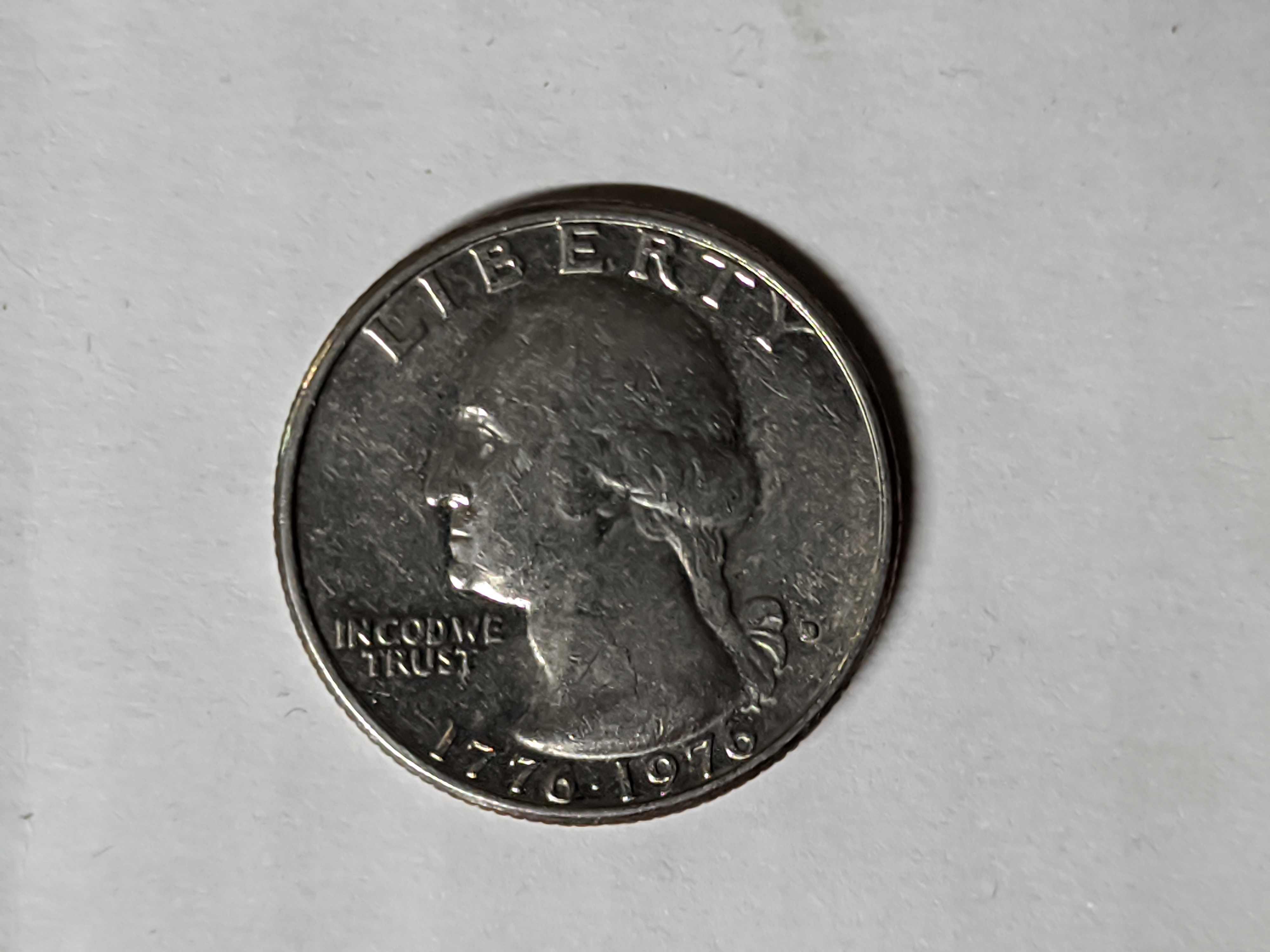 Fused-Fingers-On-A-Bicentennial-Quarter-1976-D