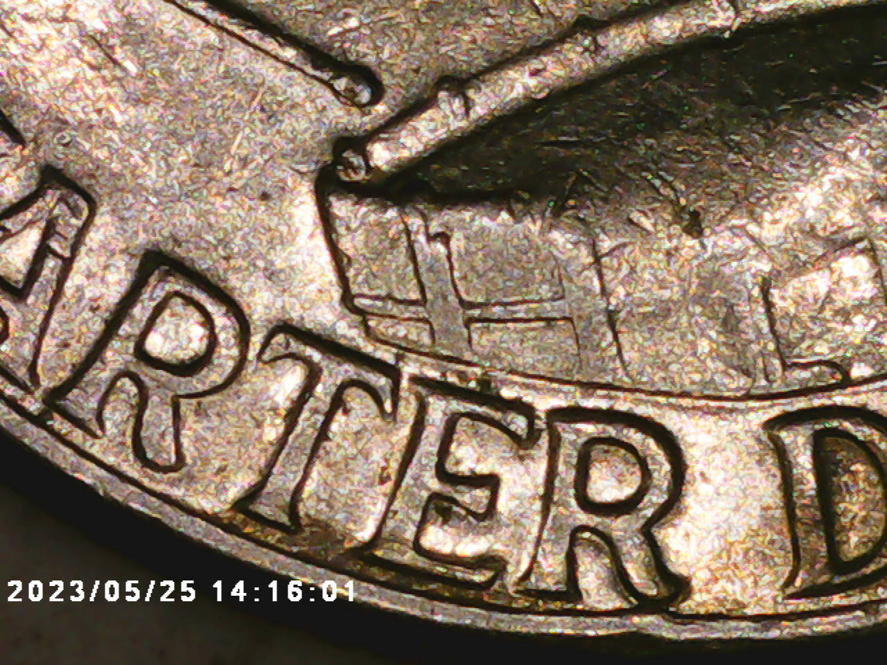 Fused-Fingers-On-A-Bicentennial-Quarter-1976-D
