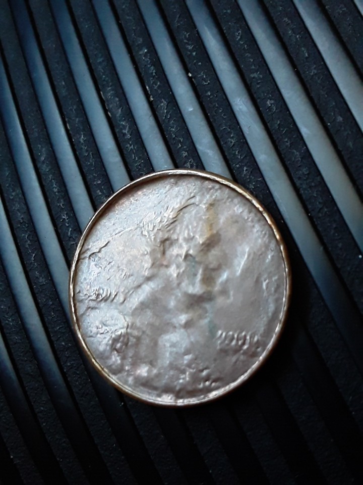 LMC---Struck-Through-Rotating-Capped-Die?