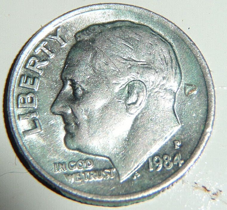 Was-An-Insect-Squished-Inside-This-Dime-When-Is-Was-Struck?-1984-P