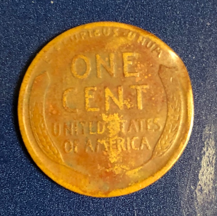 1911-Wheat-Penny-With-Indentation-Of-Another-Penny?