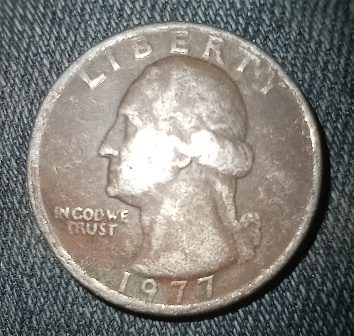 1977-Quarter-No-Mint-Mark-And-Discoloration