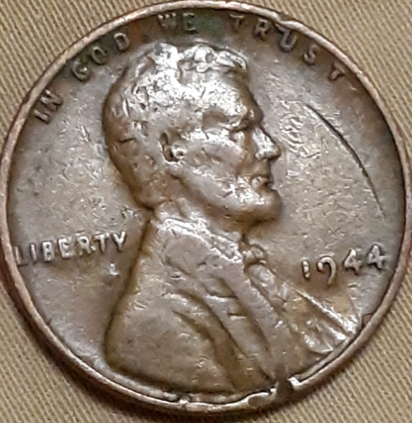 Some-Kind-Of-Rim-Error-On-A-1944-Lincoln-Wheat-Cent