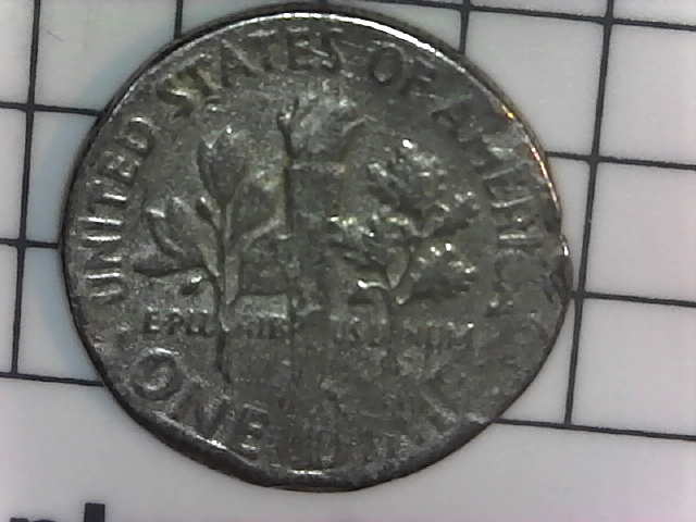 Is-This-1976-D-Dime-Enviromental-Damage-Or-Other?
