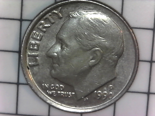 Looks-Like-This-1990-P-Dime-Is-A-Off-Center.