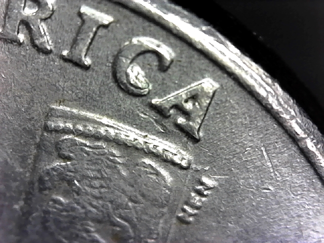 2004-P-Nickel-With-Something-Stuck-In-The-