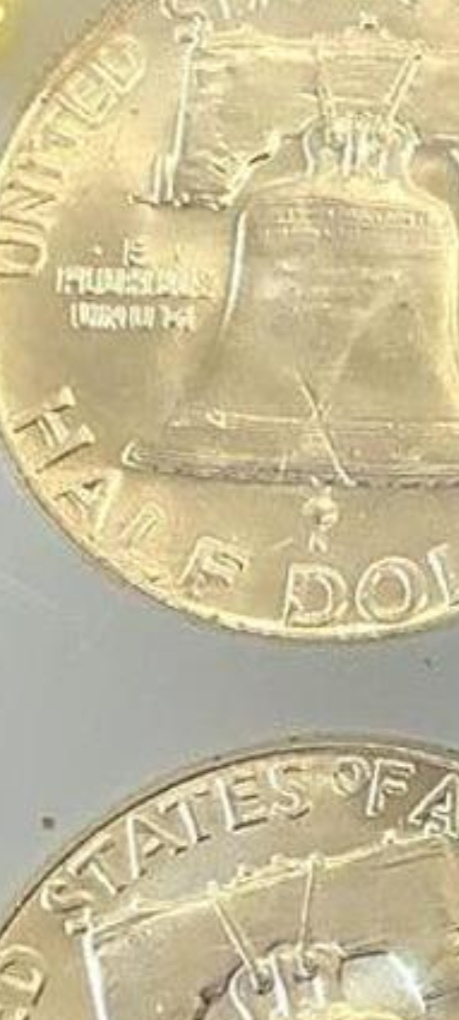 1957-D-Franklin-Half-Dollar-Missing-Portion-Of-Bell?