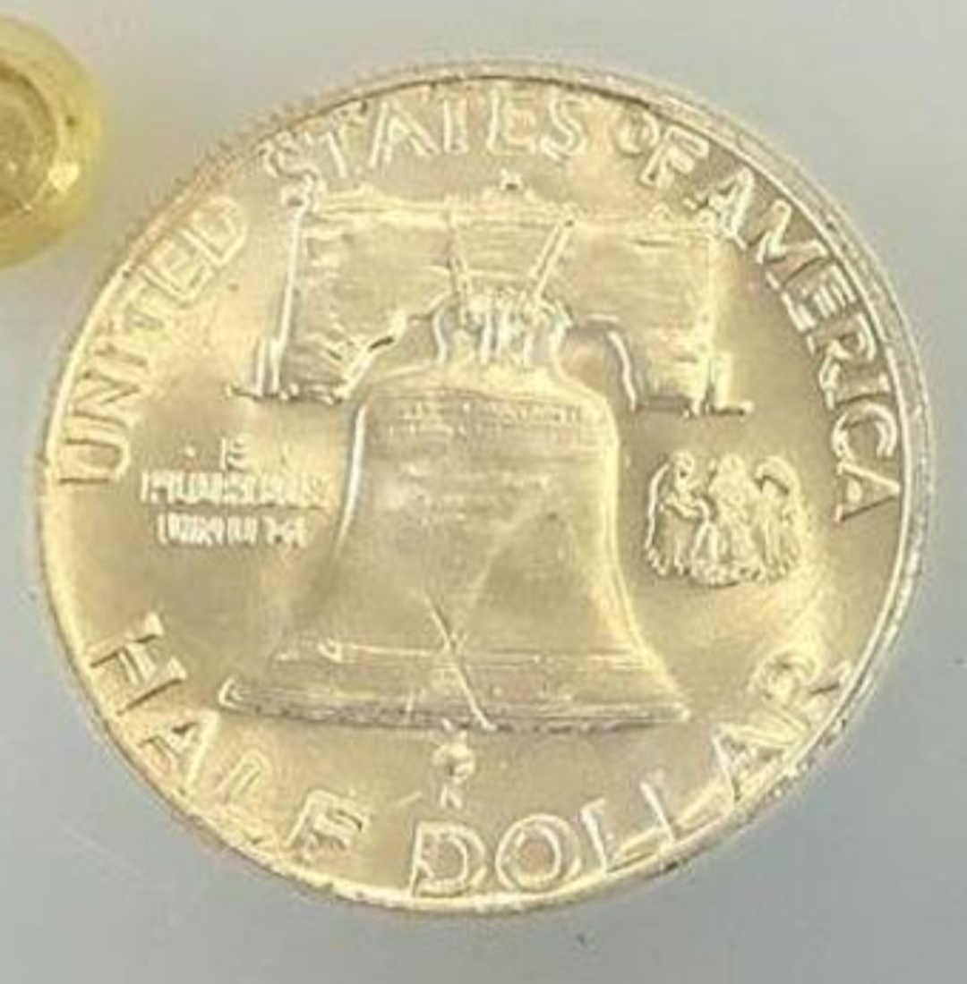 1957-D-Franklin-Half-Dollar-Missing-Portion-Of-Bell?