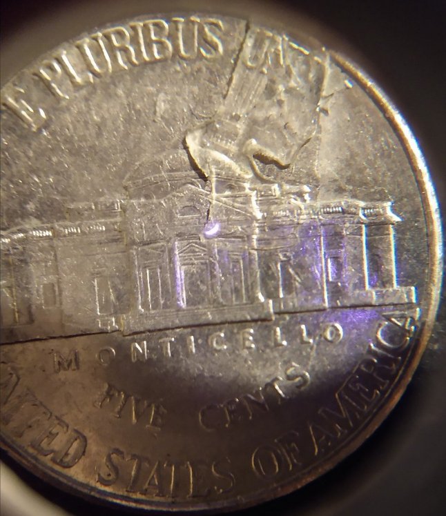 Penny-Struck-Over-1998-D-Nickel?