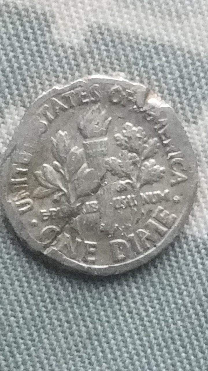 I-Found-This-Coin-In-My-Change-From-A-Local-Store.-Confused.