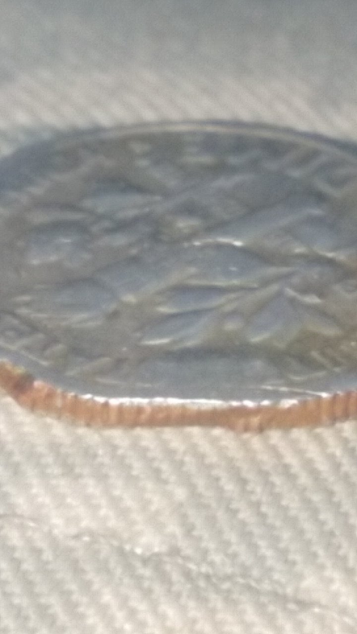 I-Found-This-Coin-In-My-Change-From-A-Local-Store.-Confused.
