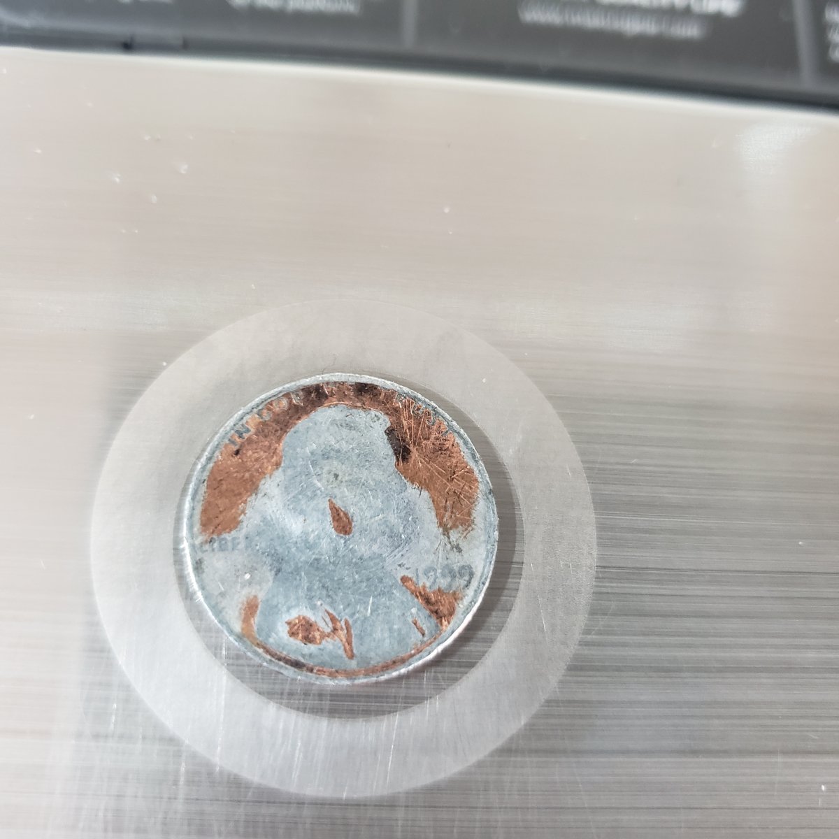 1999-Penny-Partially-Struck-On-A-Dime-Planchet?