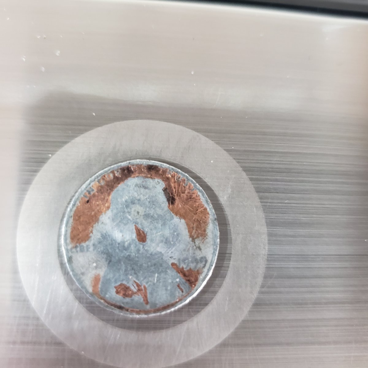 1999-Penny-Partially-Struck-On-A-Dime-Planchet?