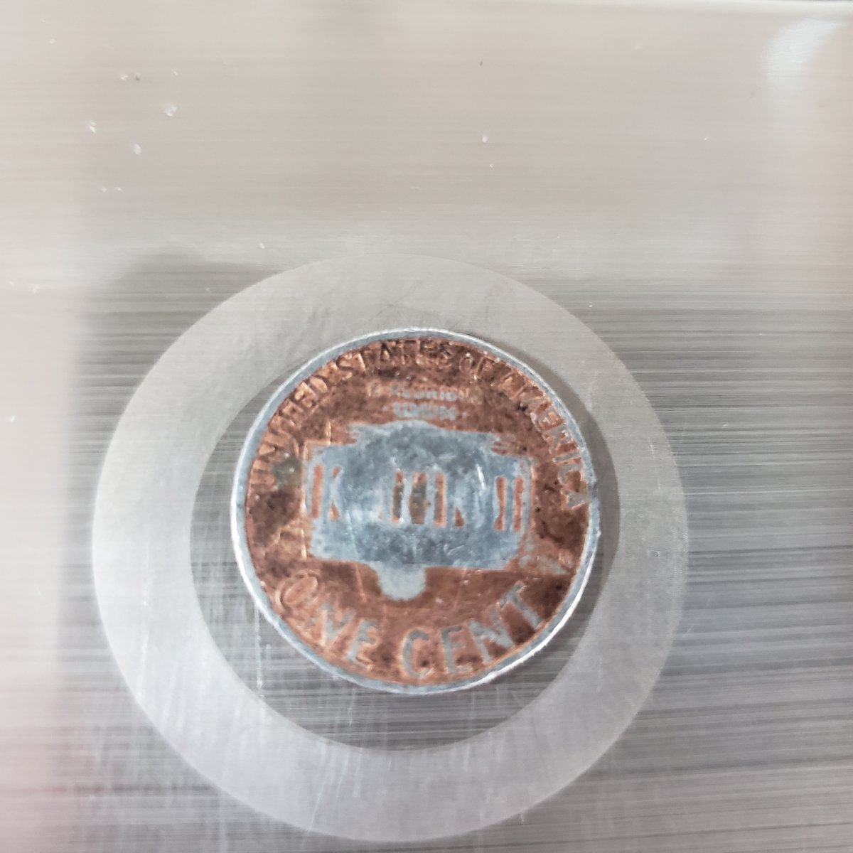 1999-Penny-Partially-Struck-On-A-Dime-Planchet?