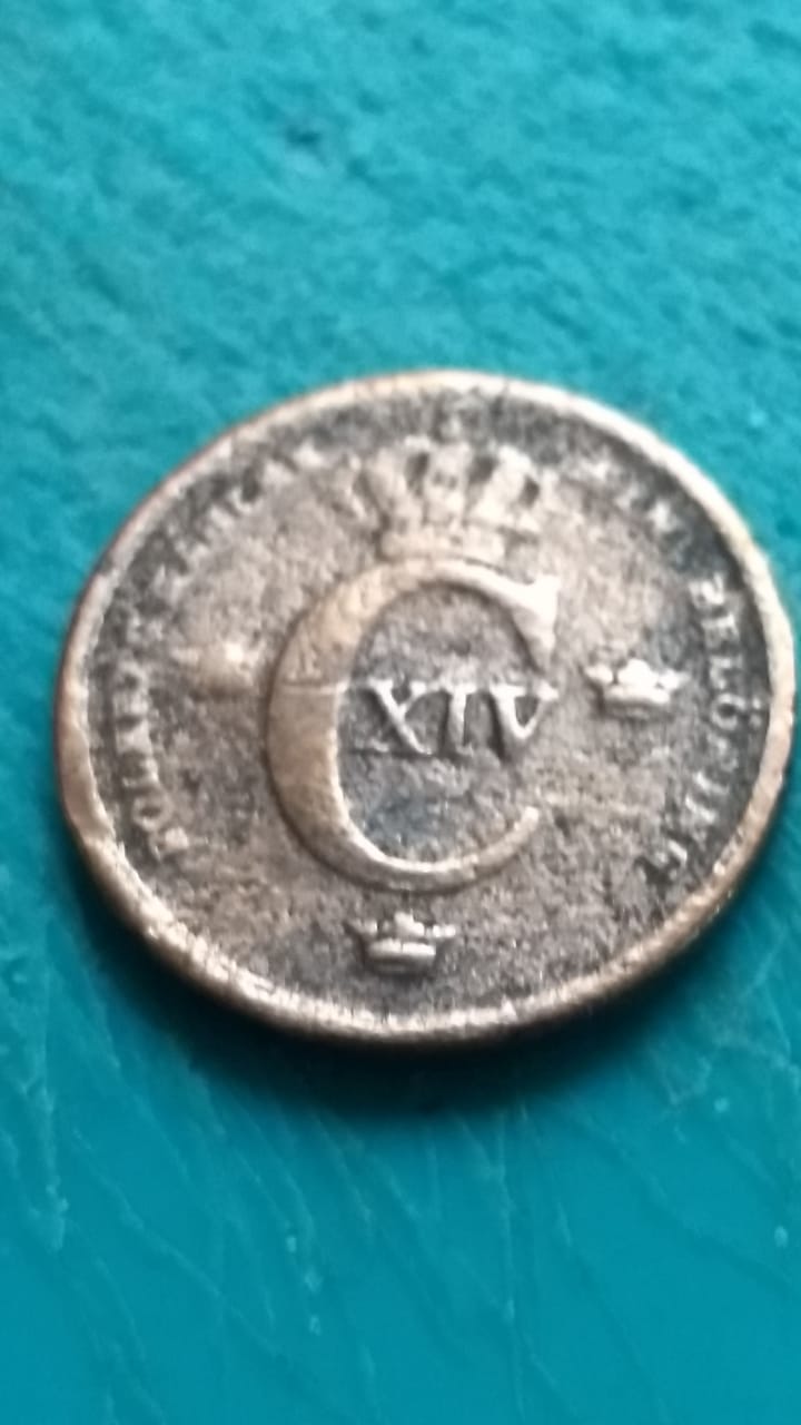 A-Coin-With-A-Big-Letter-C-And-A-Crown-To-Identify-Please