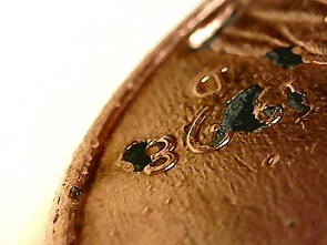 1998-D-Cent-With-Seemingly-Non-Random-Damage