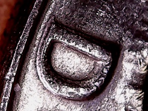 1977-D-Eisenhower-Machine-Damage-Or?