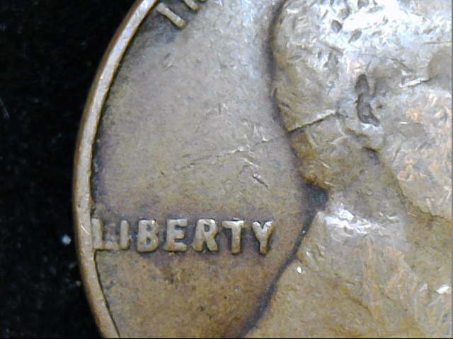 1951-LMC-With-Crack-Or-Gouge-Through-Head
