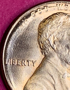 1987-Penny-Clear-Doubling,-But-What's-Up-With-This-Small-Extra-Letter-E?