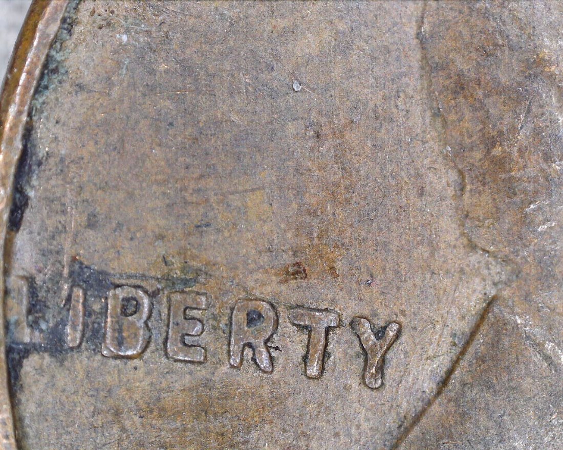 1957-D-Penny-With-Die-Break-In-