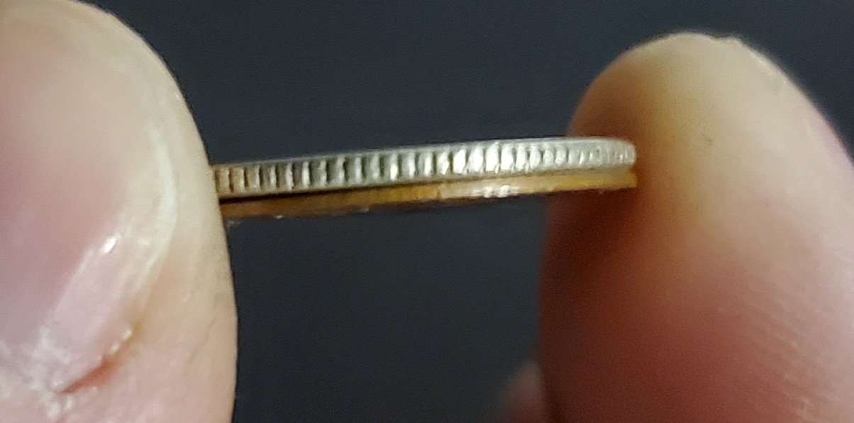 1957-Canadian-Penny-Possibly-On-A-Dime-Sized-Copper-Blank