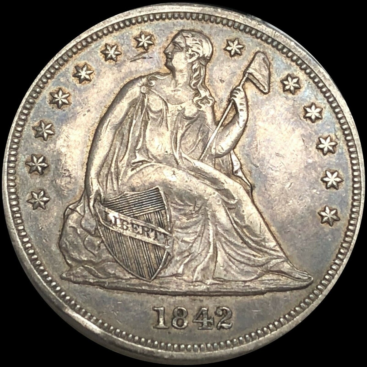 1842-Liberty-Seated-Dollar