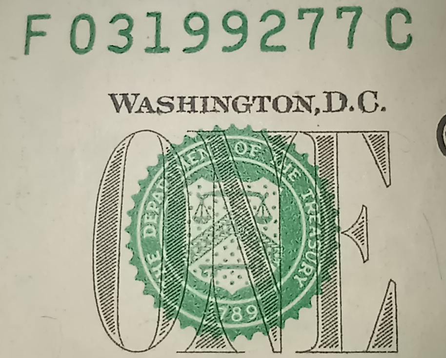2017A-$1-Bill-With-One-Black-Serial-Number-And-One-Green-Serial-Number.