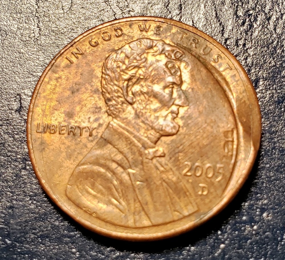 Error-Or-Post-Mint-Damage?-2005-D-LMC
