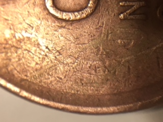 Is-This-Penny-A-Product-Of-A-Grease-Filled-Die?