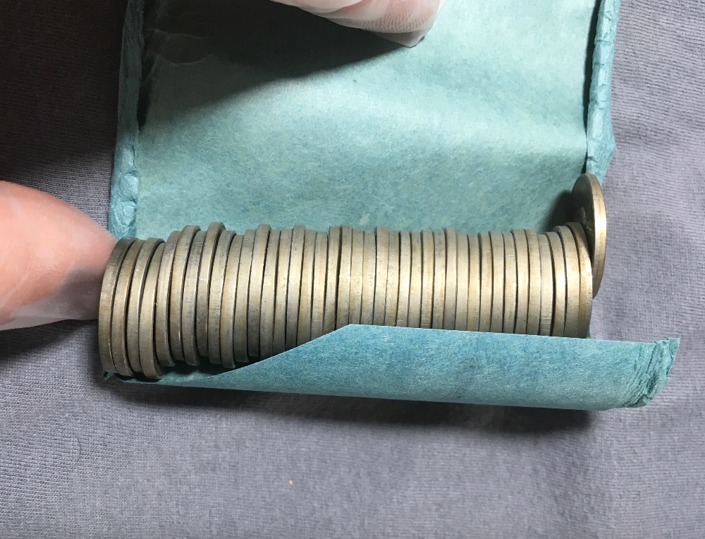 Does-This-Original-Bank-Roll-Of-Nickels-Look-Unopened/Legitimate?