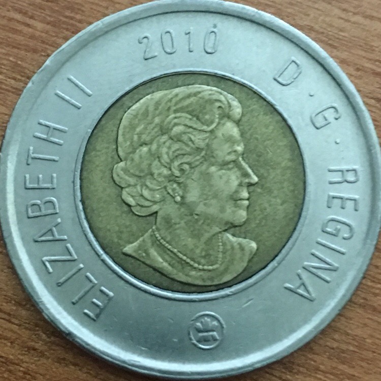 2010-$2-Toonie-With-14-Serrations-And-Uncentered-Core
