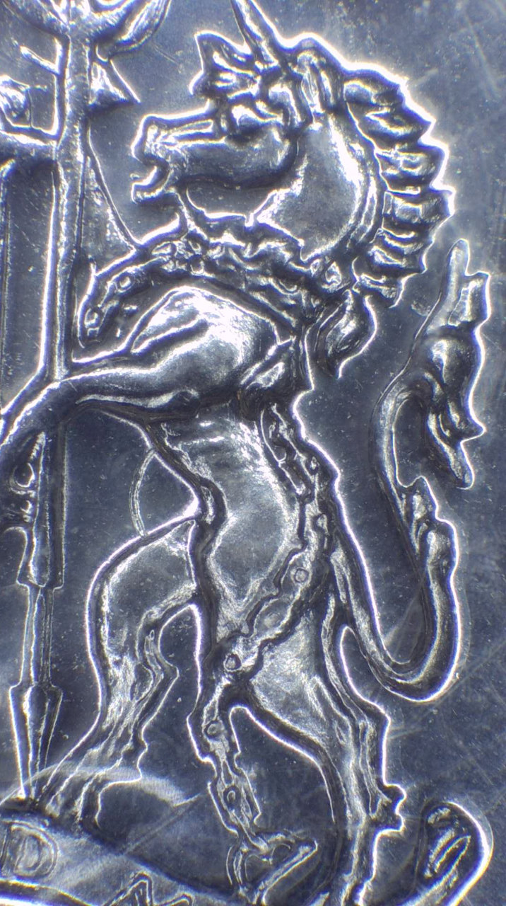 1976-50-Cent-Coin,-Reverse-Strike-Through