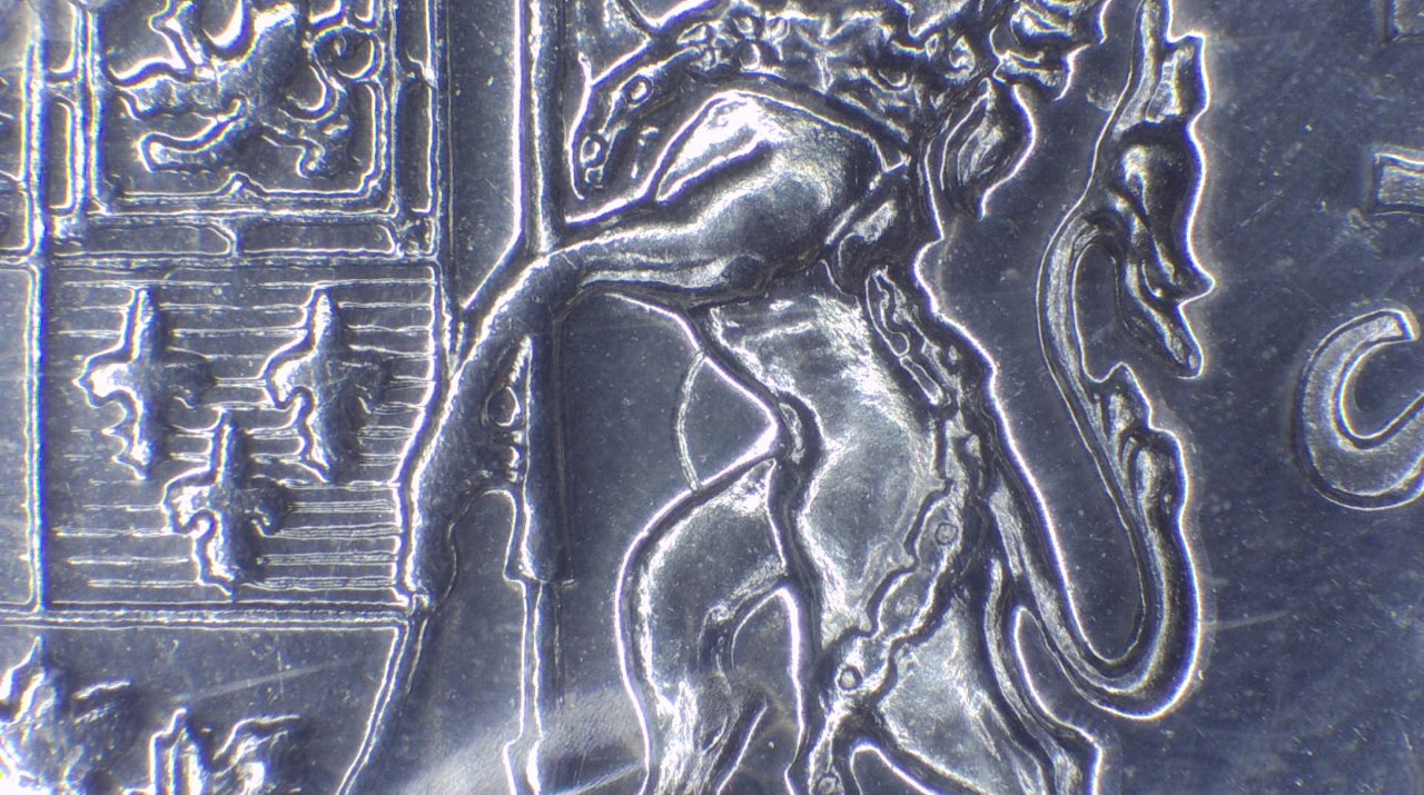 1976-50-Cent-Coin,-Reverse-Strike-Through