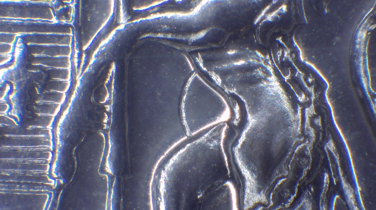 1976-50-Cent-Coin,-Reverse-Strike-Through