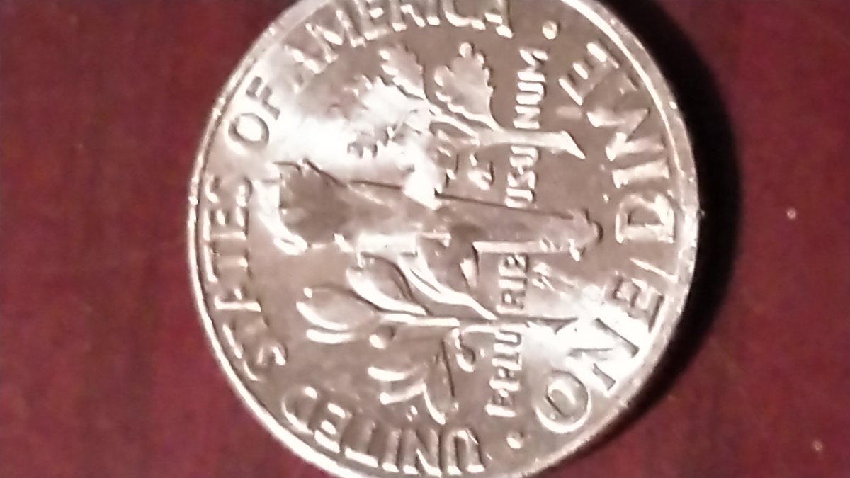2012-P-Dime-Error-Front-An-Back.-Blank-Torch-And-Branches-On-Back,-Blank-On-Chin