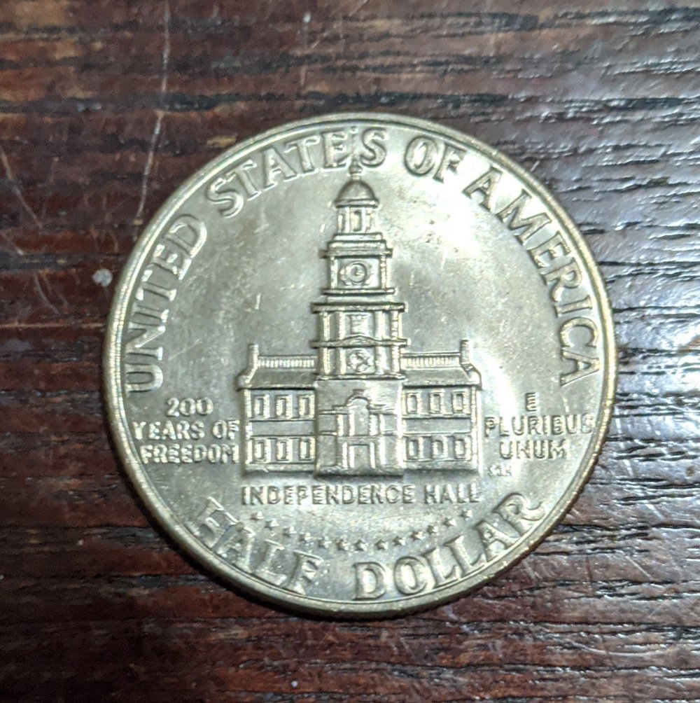 HI-She's-Back.-Kennedy-Half-Dollar-Bicentenial-With-A--Big-Error