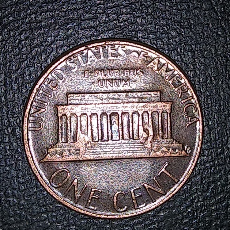 Need-Help-I-Have-1985-Penny-With-Weird-Punch-Marks.