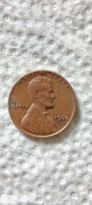 1964-Penny-With-Strange-Date