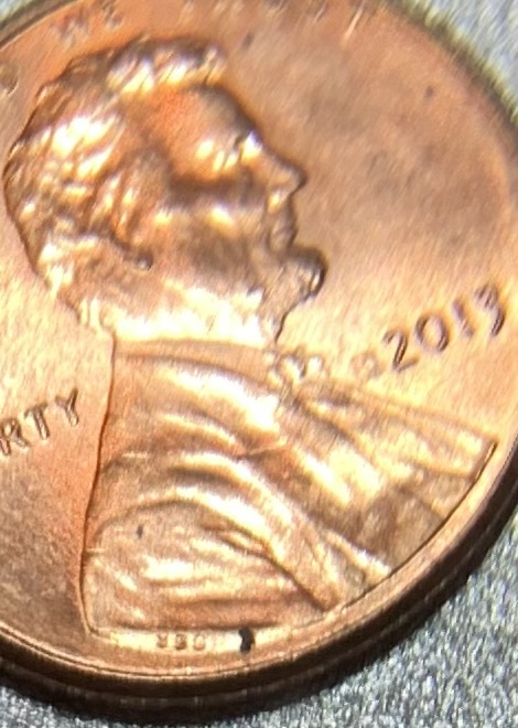 2013-Lincoln-Penny-With-Unusual-Mark-Near-Date