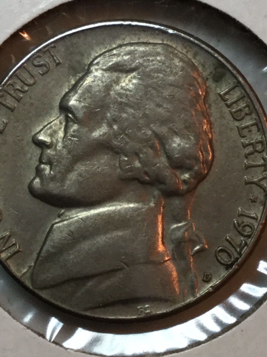 Only-A-Top-Of-A-Nickel
