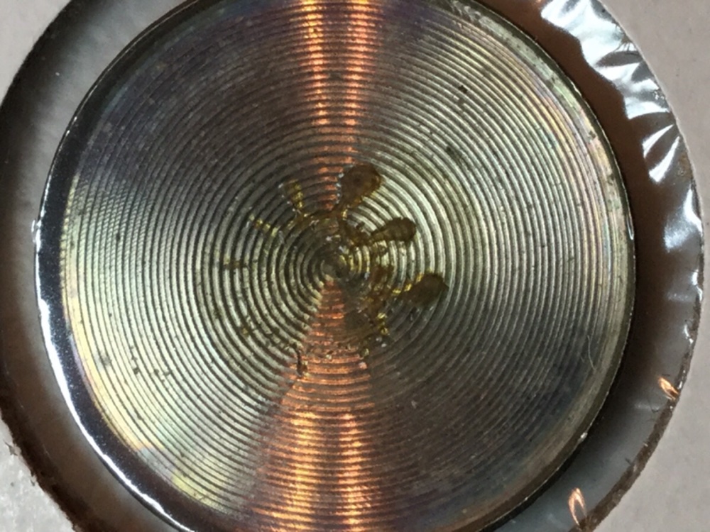 Only-A-Top-Of-A-Nickel