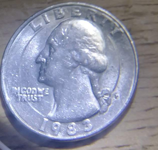 Circular-Mark-On-A-Washington-Quarter