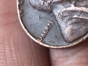 Can-Anyone-Explain-What's-Happened-To-The-Y-On-This-1968-Penny!?