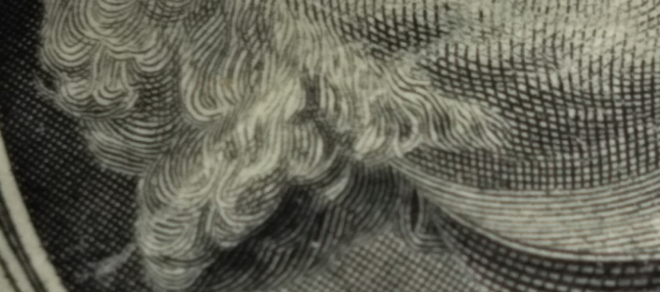 2013-Dollar-Bill-Looks-Like-Thread-Is-Through-Face