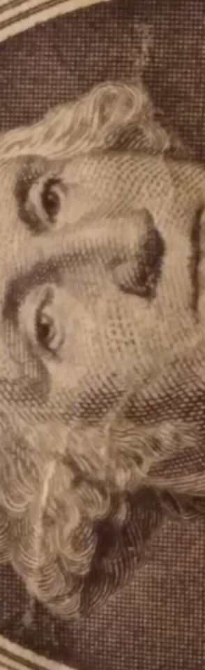 2013-Dollar-Bill-Looks-Like-Thread-Is-Through-Face