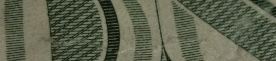 2013-Dollar-Bill-Looks-Like-Thread-Is-Through-Face