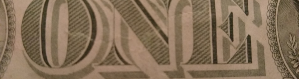 2013-Dollar-Bill-Looks-Like-Thread-Is-Through-Face