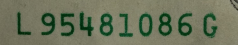 2013-Dollar-Bill-Looks-Like-Thread-Is-Through-Face